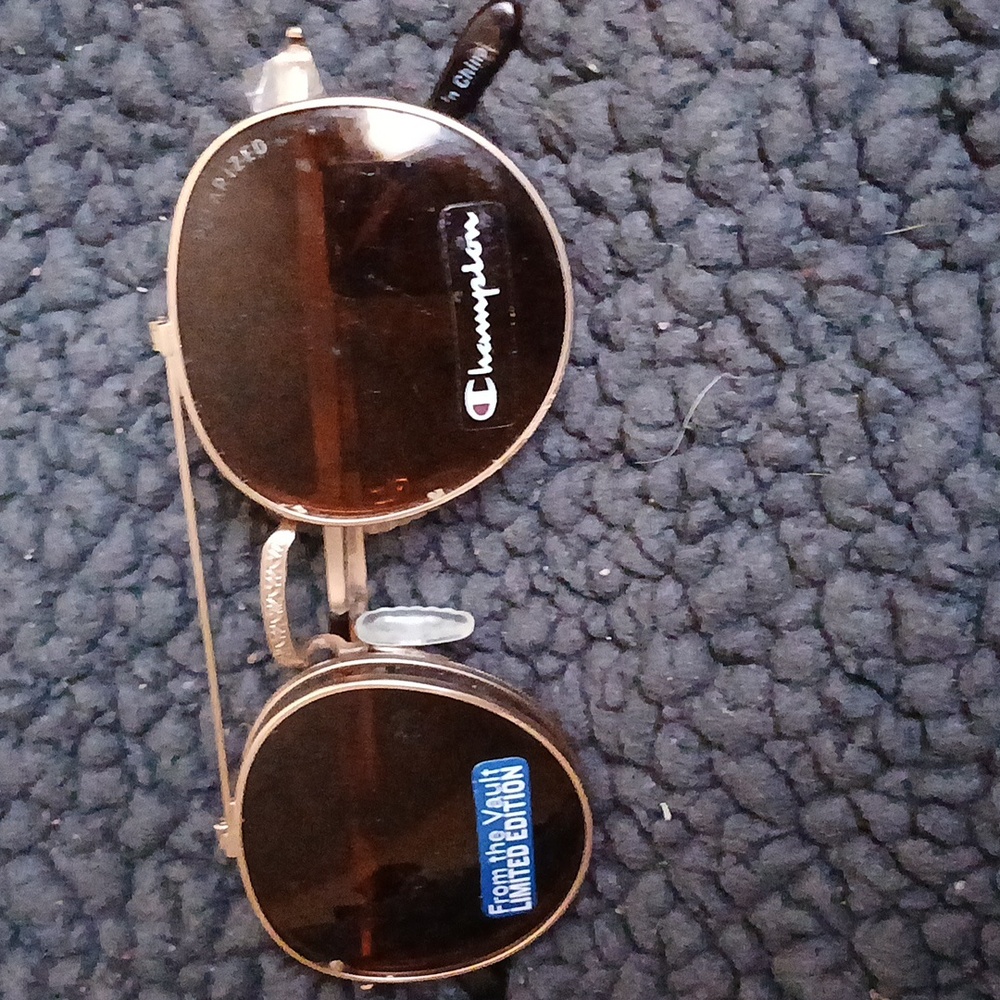 Limited edition boy Champion flipped up shades to glasses.